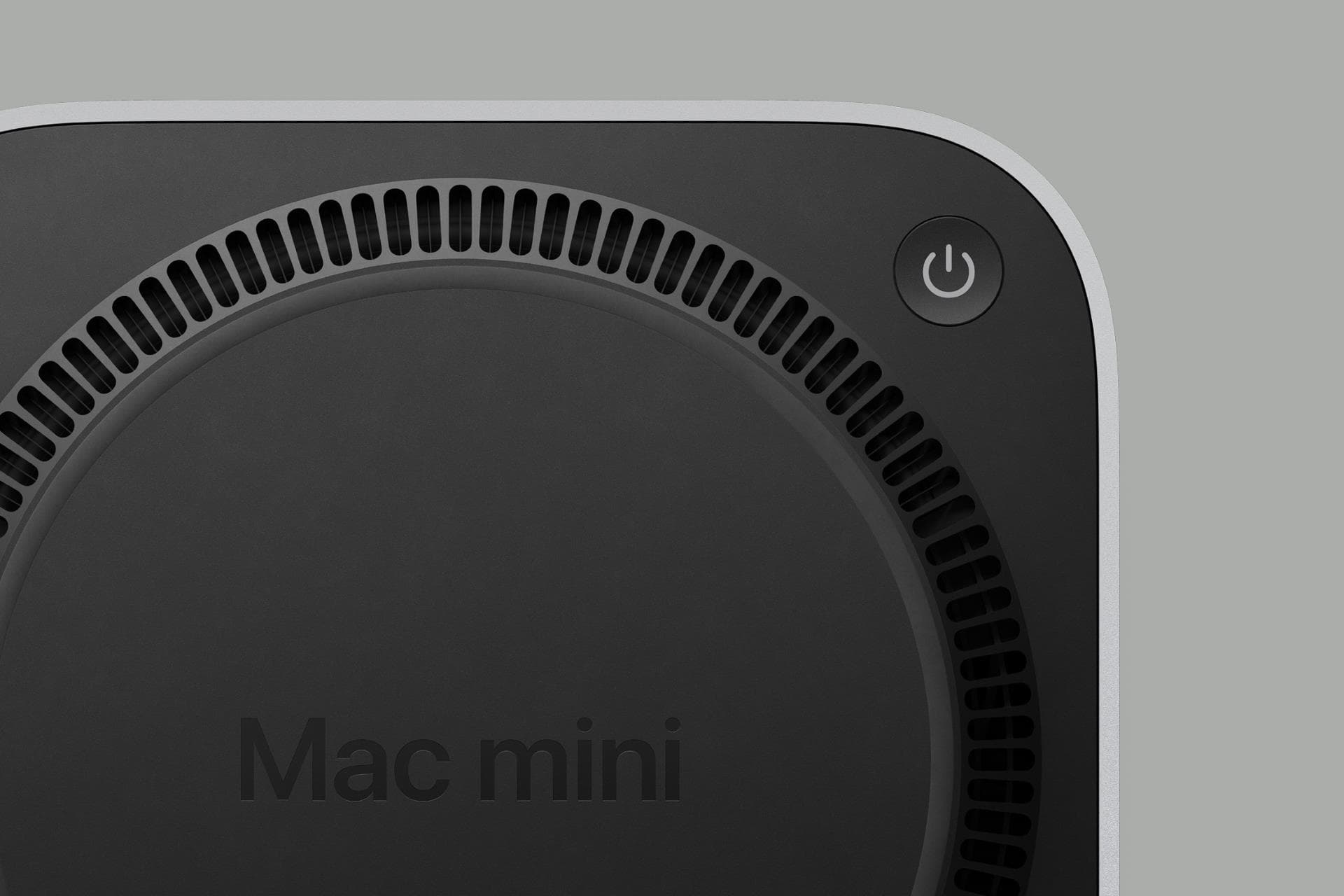 Mac Mini má zapínací tlačítko umístěné zespodu